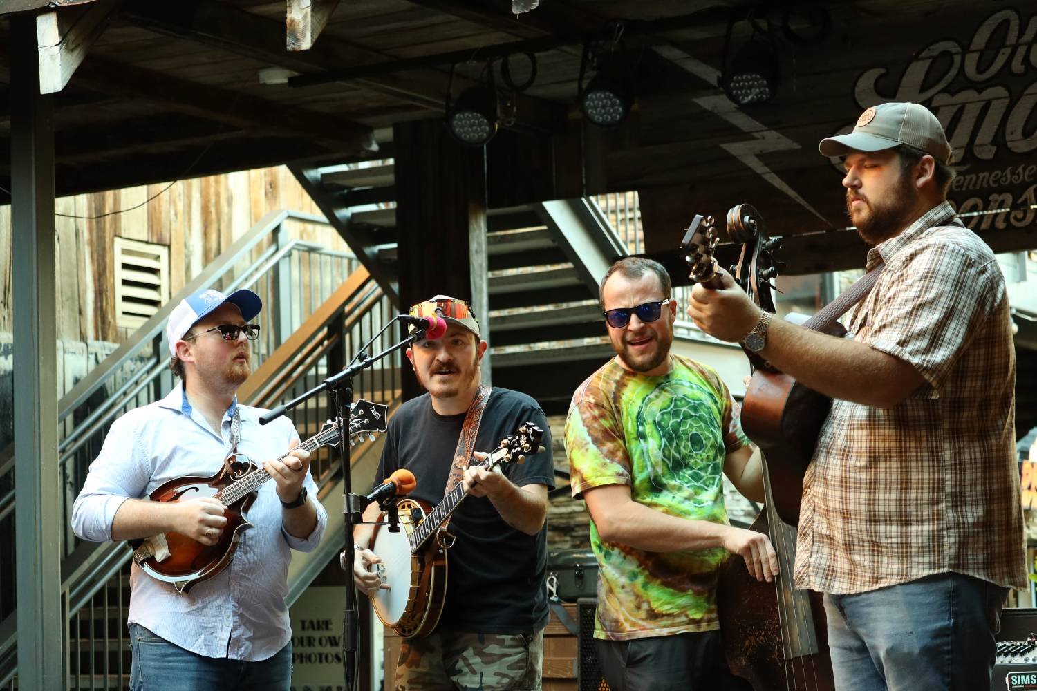 Bluegrass band playing live music on a stage in Gatlinburg